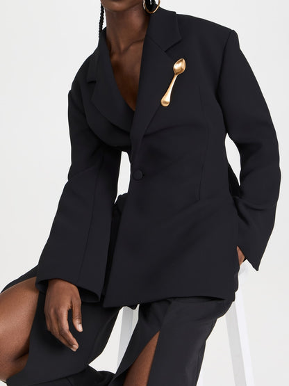 Scoop embellished backless blazer